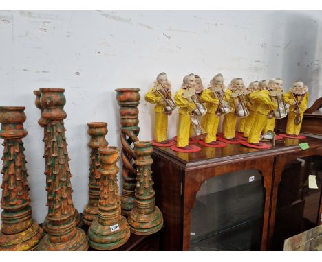 A QUANTITY OF CARVED WOOD CANDLESTICKS AND EGG TIMER FIGURES. 