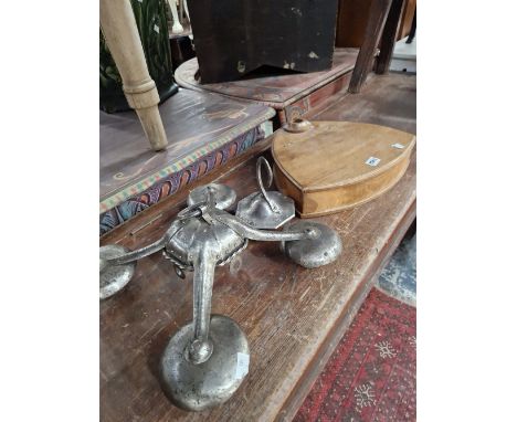 AN ARTS AND CRAFTS CHANDELIER AND AN OAK STAND.