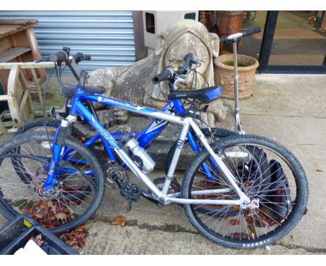 TWO MOUNTAIN BIKES, A PAIR OF ROLLER BLADES AND A SCOOTER.