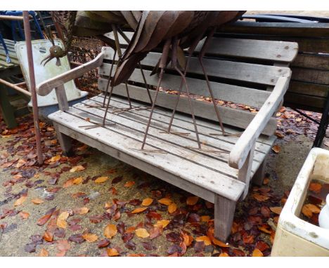 A TEAK GARDEN BENCH.