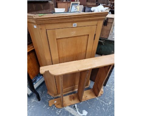 A VICTORIAN PINE CORNER CABINET AND A WALL SHELF. 