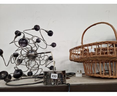 A CHANDELIER WITH THE LIGHT SOCKETS ARRANGED ON SCROLLING WIRES TOGETHER WITH A BASKET FOR A WINE BUCKET AND GLASSES