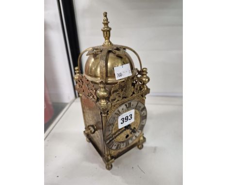 A SMALL ANTIQUE LANTERN CLOCK. 