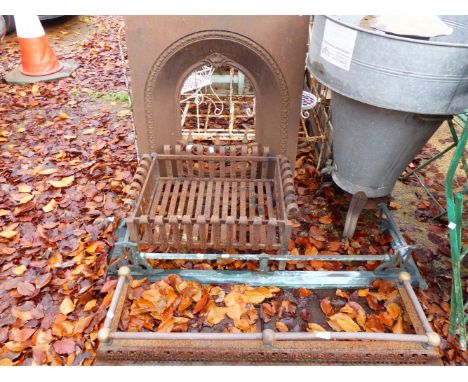 A CAST IRON FIRE INSERT, A GRATE AND TWO FENDORS.