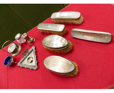 A HALLMARKED SILVER BASED INK STAND, A SILVER SALT, BACKED DRESSING TABLE BRUSHES, A PEPPER GRINDER, AND A NEST OF CONTINENTA