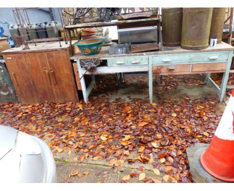 A LARGE WORK BENCH TOGETHER WITH A TEAK THREE DOOR CUPBOARD.