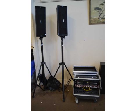 A pair of Bose speakers together with a Bose amplifier
