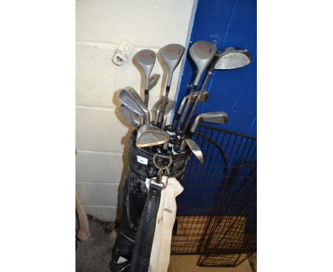 Golf caddy and assorted clubs