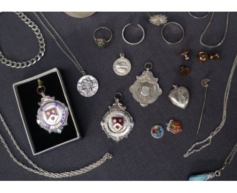 A sterling silver bangle together with silver sports medallions, silver chains and other silver jewellery, overall approximat