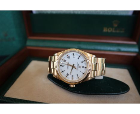 An 18ct gold Rolex Oyster Perpetual superlative chronometer wristwatch, the white dial with Roman numerals and batons,  34mm 