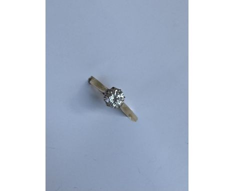 A solitaire diamond ring, the round old cut diamond approximately 0.7cts to an 18ct yellow gold setting and shank, size K, ap