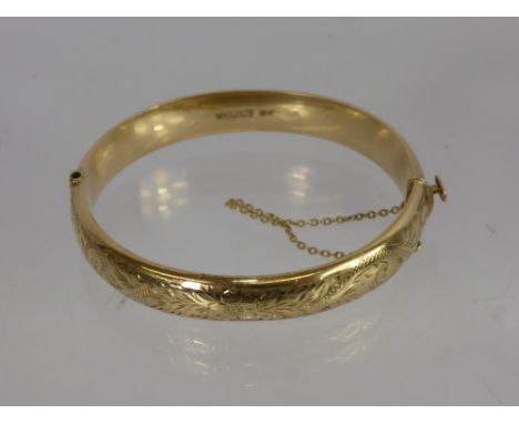 A Lady's 9 ct Gold Bangle