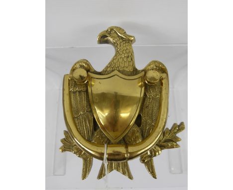 A Brass Door Knocker, in the form of an Imperial Eagle, approx 17 x 14 cms