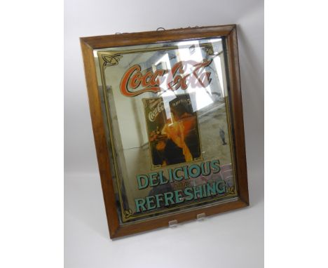 A Vintage 'Raleigh' Enamel Advertising Sign, together with a vintage Coca Cola advertising mirror approx 48.5 x 61 cms togeth