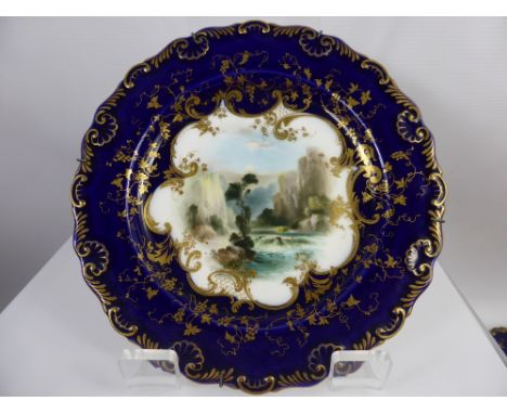 Three Royal Worcester Cabinet Plates, hand painted with Highland scenes.