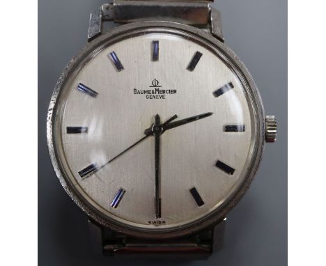 A gentleman's 1970's stainless steel Baume &amp; Mercier manual wind wrist watch, on associated flexible strap.