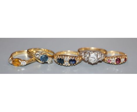 Five assorted 18ct and gem set rings, including a late Victorian ruby and diamond ring.