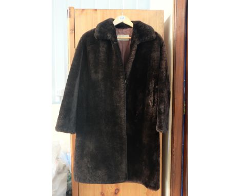 Beaver Lamb three quarter length fur coat with Tescan label to interior