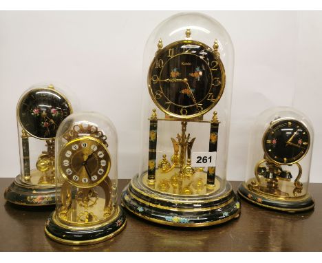 Four vintage enamelled torsion pendulum clocks three with plastic domes one with glass, tallest overall H. 28.5cm. Condition 