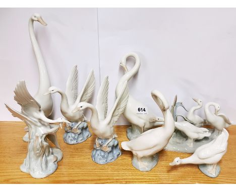 Seven porcelain Nao figures and one Lladro figure, all of geese and ducks, tallest H. 35cm.