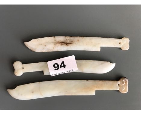 A group of three white jade blades used for skin cleaning in early Chinese steam baths. Longest 16cms. Condition good.
