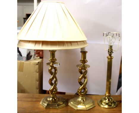 A pair of brass table lamps and shades and a further gilt brass lamp, tallest H. 68cm.