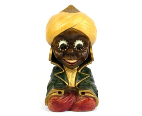 A vintage carved wooden and painted Aladdin alarm clock, H. 21cm. Condition - Currently not in working order and missing the 
