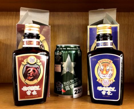 A North Korean commemorative edition of World War II in memory of US Army canned drink, together with two boxed North Korean 