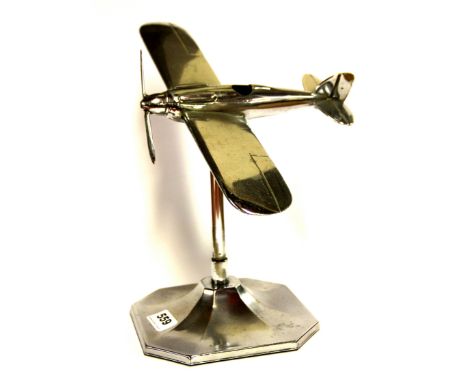 An Art Deco airplane Schneider cup trophy with rotating propeller, H. 28cm.