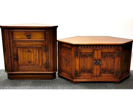 A linen fold decorated oak corner cabinet, 75 x 50cm, and similar corner tv stand, 50 x 100 x 50cm.