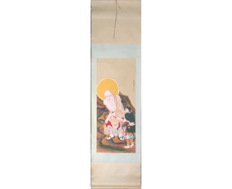 A Chinese scroll painting on silk mounted on paper and silk of an Arhat, size 57 x 207cm.