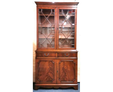 A mahogany veneered display cabinet, 185 x 90 x 32cm.