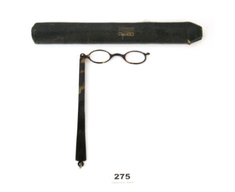A 19th Century leather cased tortoise shell lorgnette, L. 21.5cm. Condition - Good, minor damage to case.