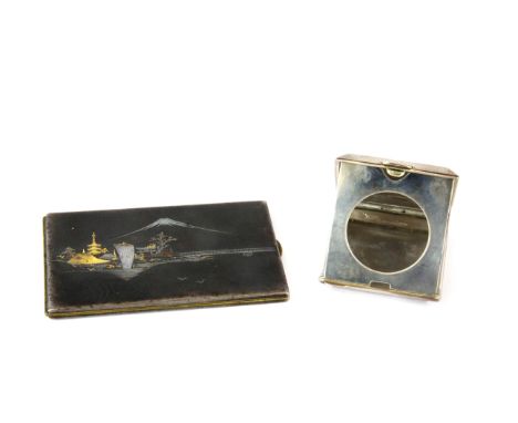 A hallmarked silver travelling clock case together with a Japanese silver decorated metal cigarette case, longest L. 12cm.