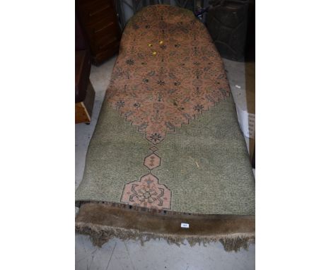 A traditional carpet squaregeneral wear with age, npo major holes 