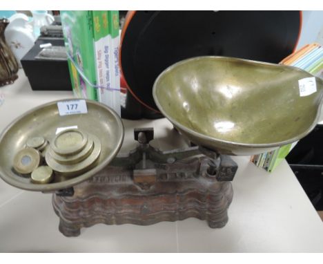 A brass and cast scale set made in France