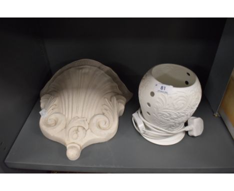 a plaster cast wall sconce and similar parian ware light by Cello