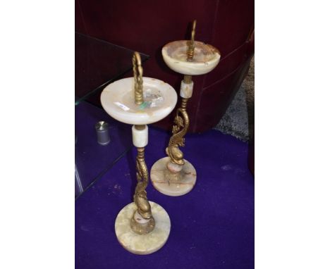 A pair of vintage brass and onyx ashtrays/trinket stands
