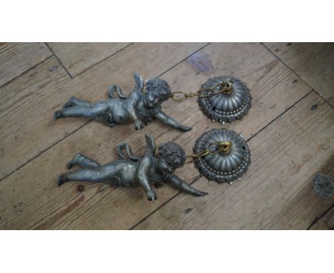 A pair of spelter figural cherub and faceted glass light fittings. 
