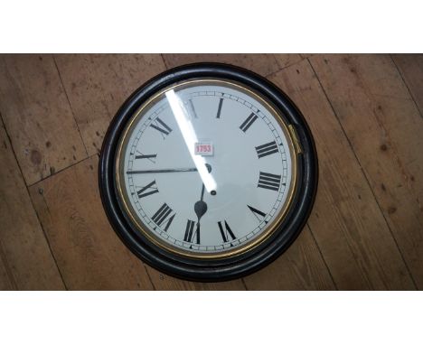 An ebonized circular wall clock, 39cm diameter. 