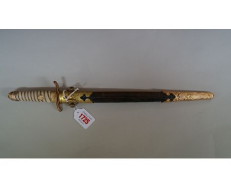 A Japanese World War II naval dirk and scabbard. 