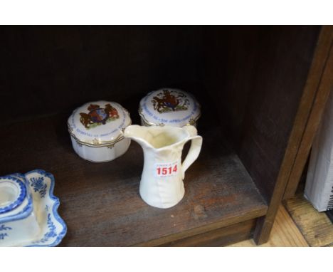 A Royal Worcester acanthus leaf cream jug, 10cm high; together with two Royal Crown Derby commemorative boxes and covers 