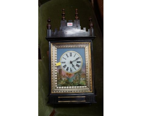 A Black Forest ebonized wall clock, circa 1870, with bird cage type movement, 59cm high. 