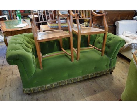 A circa 1900 button upholstered Chesterfield.  Condition Report: Appears in good/clean, used condition.  Although it will not