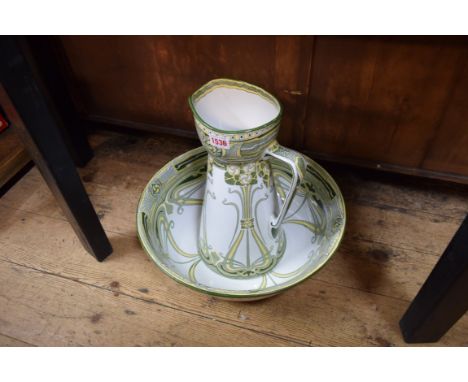 A Royal Doulton 'Aubrey' pattern jug and basin, basin 41cm diameter, (jug cracked). 