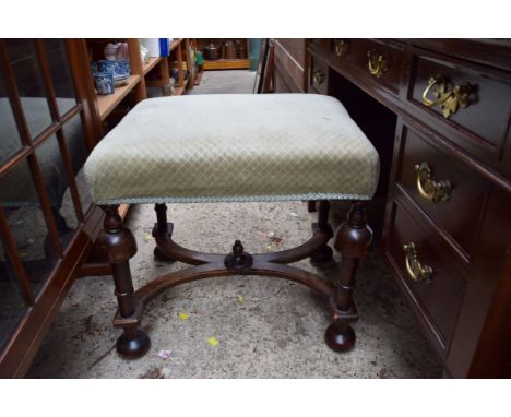 A Queen Anne style walnut and upholstered stool. 