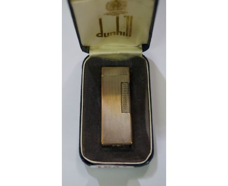 A boxed Dunhill electroplated lighter. Condition Report: Lacking screw cap to base. 
