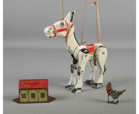 A collection of metal collectibles including Muffin the Mule diecast puppet, Tinplate sweet tin Rowntree's and a lead figure 