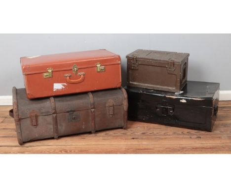 A collection of vintage trunks and suitcases, to include wooden bound trunk and 1964 military ammunition box.  