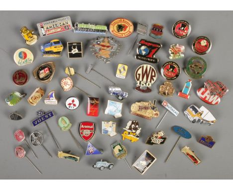 A quantity of vintage pin and stick badges. Includes Wade, Vauxhall Muscle, etc.  